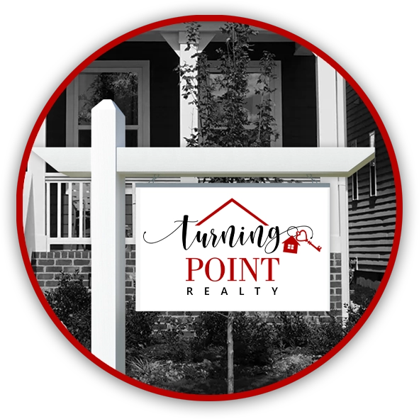 turning point realty sign in front of house copy
